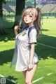 A girl in a white dress standing on a soccer field.